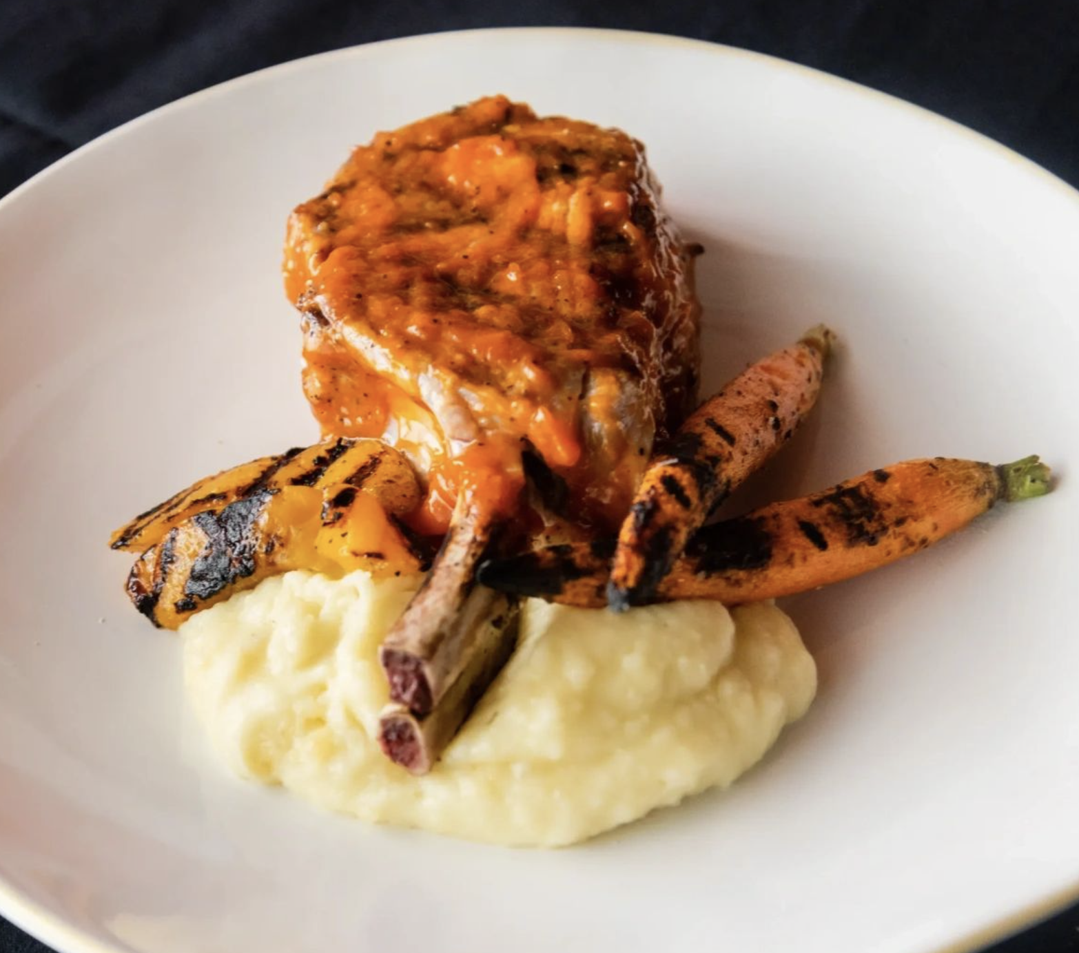 Grilled lamb chop at Mezzanotte Ristorante